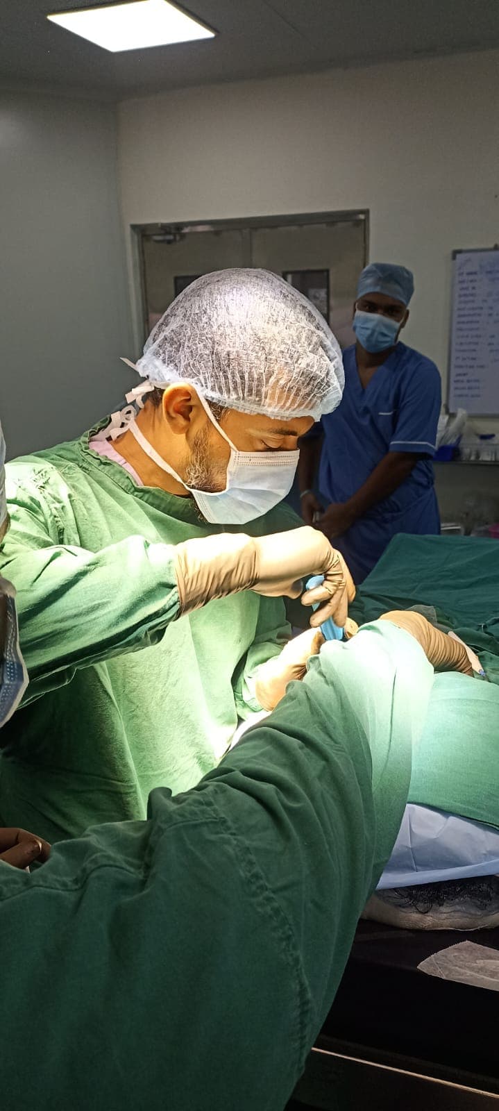 Dr Sidney Dsa performing surgery